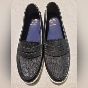 Cole Haan black leather loafers with white trim